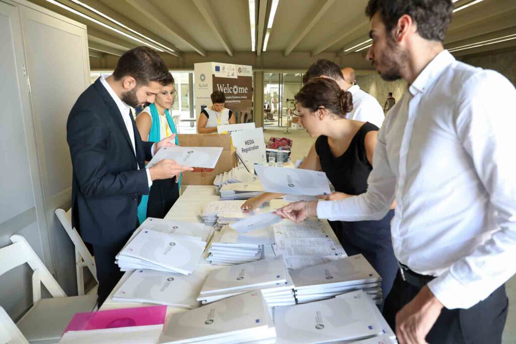 NjoyCreations team organizing and managing Minjara launch event logistics and setup in Tripoli Lebanon